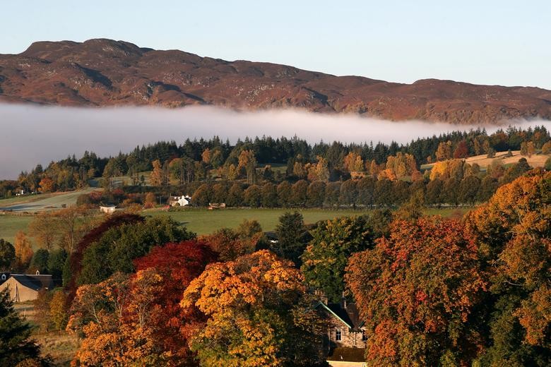 Mist hangs over Pitlochry, Scotland, Britain October 17. REUTERS/Russell Cheyne